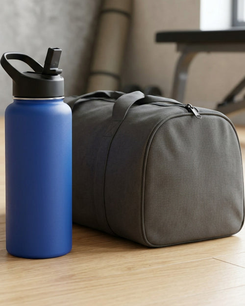 Wiklu Wide-Mouth Vacuum-Insulated Sports Water Bottle 32 oz Cobalt Loop Straw Lid - Lifestyle view